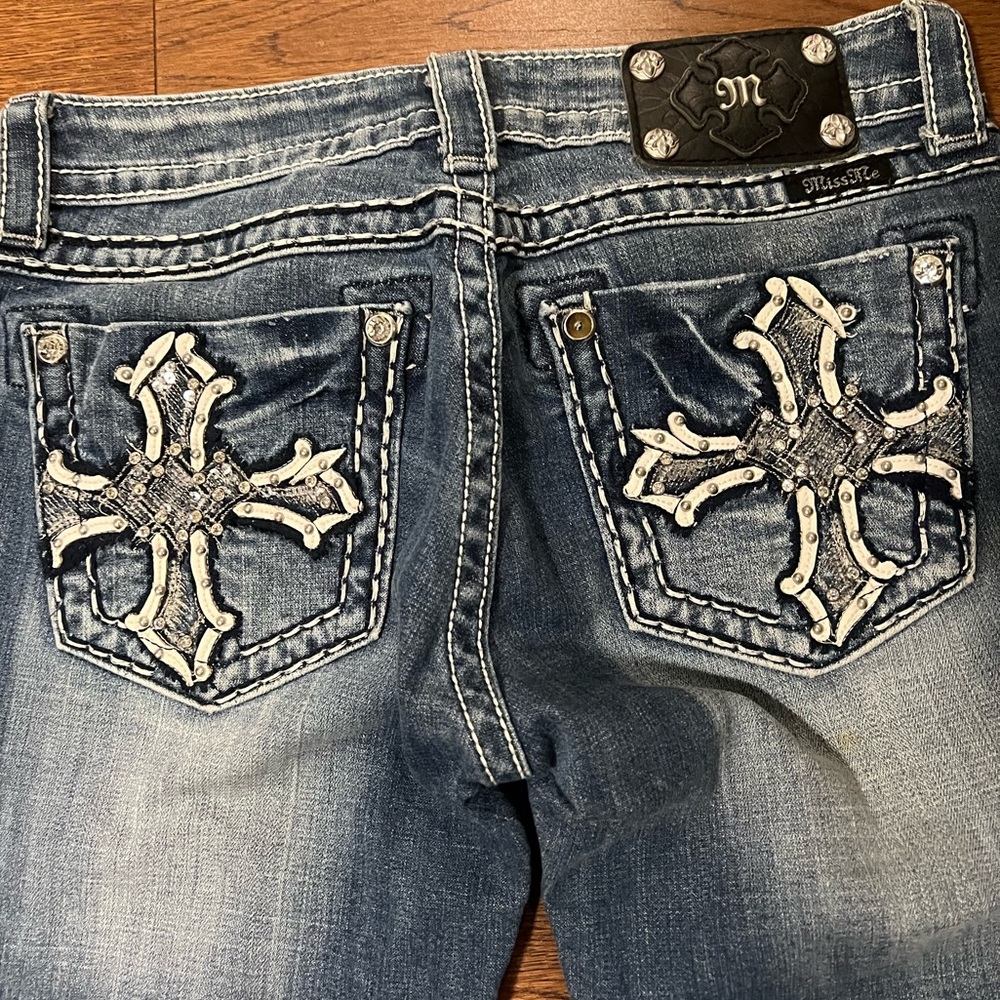Miss Me brand jeans with bedazzled embroidered cross pockets